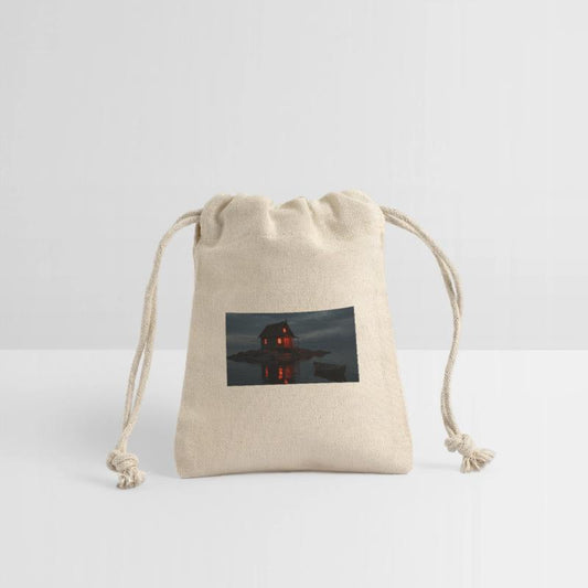 A small, rustic wooden cabin with a pitched roof