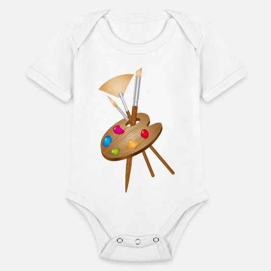 Artist's palette with colorful paints and brushes