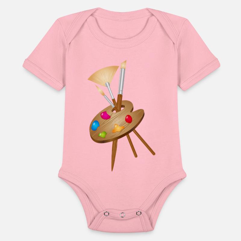 Artist's palette with colorful paints and brushes